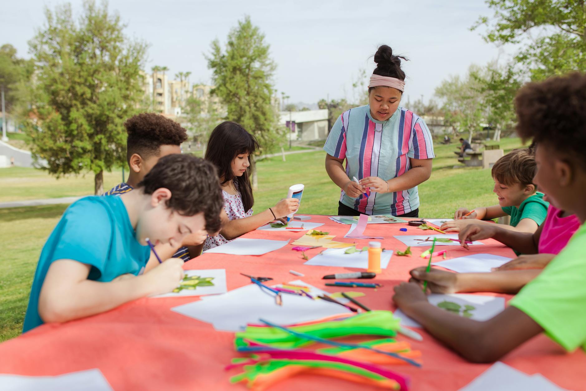 kids drawing at a table